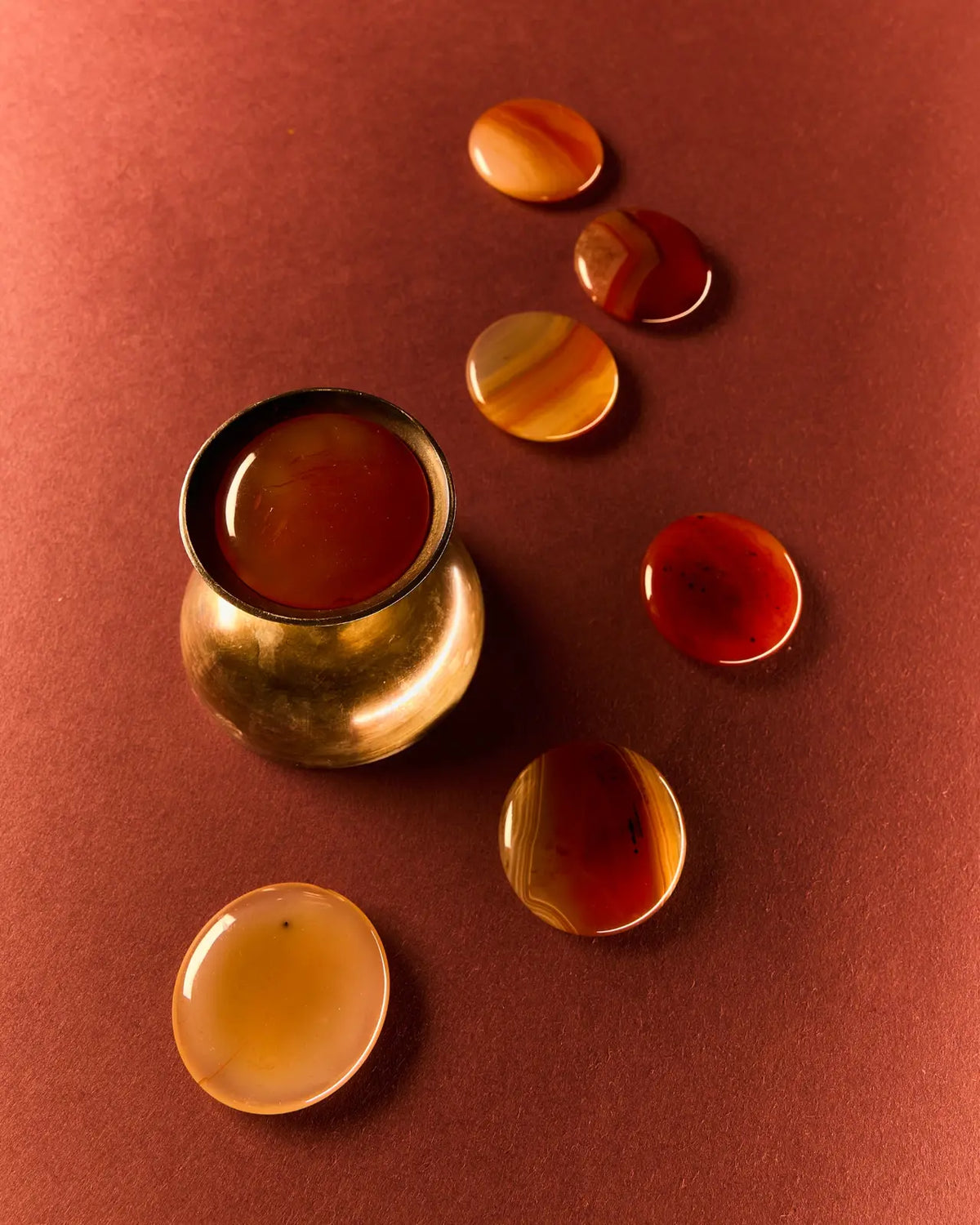 The carnelian paired with the Aura candle